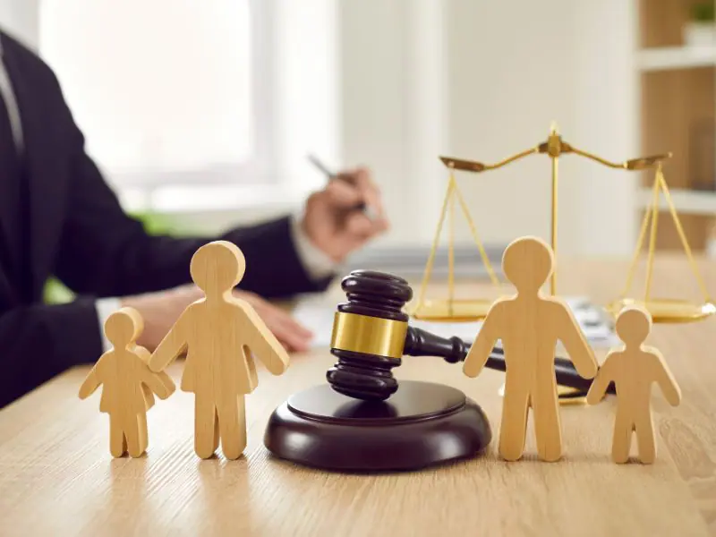 A family attorney, gavel, and blocks representing a family in Brooklyn.