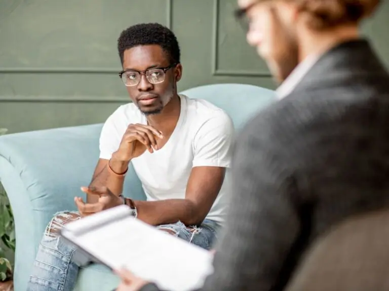 Private psychologist interviewing client